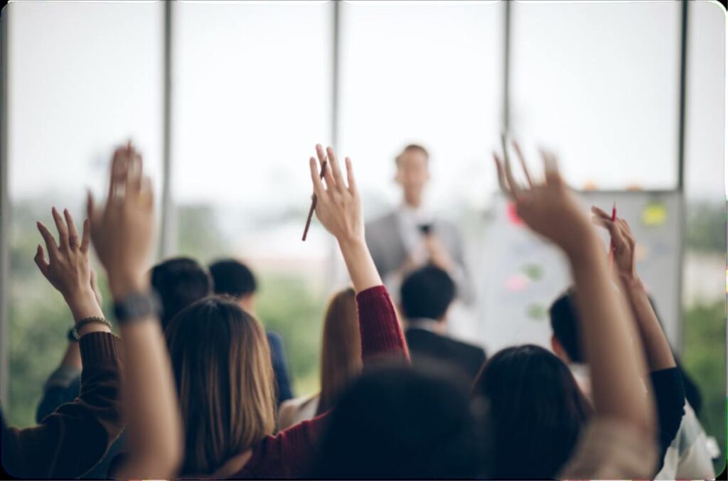 People Raising Their Hands